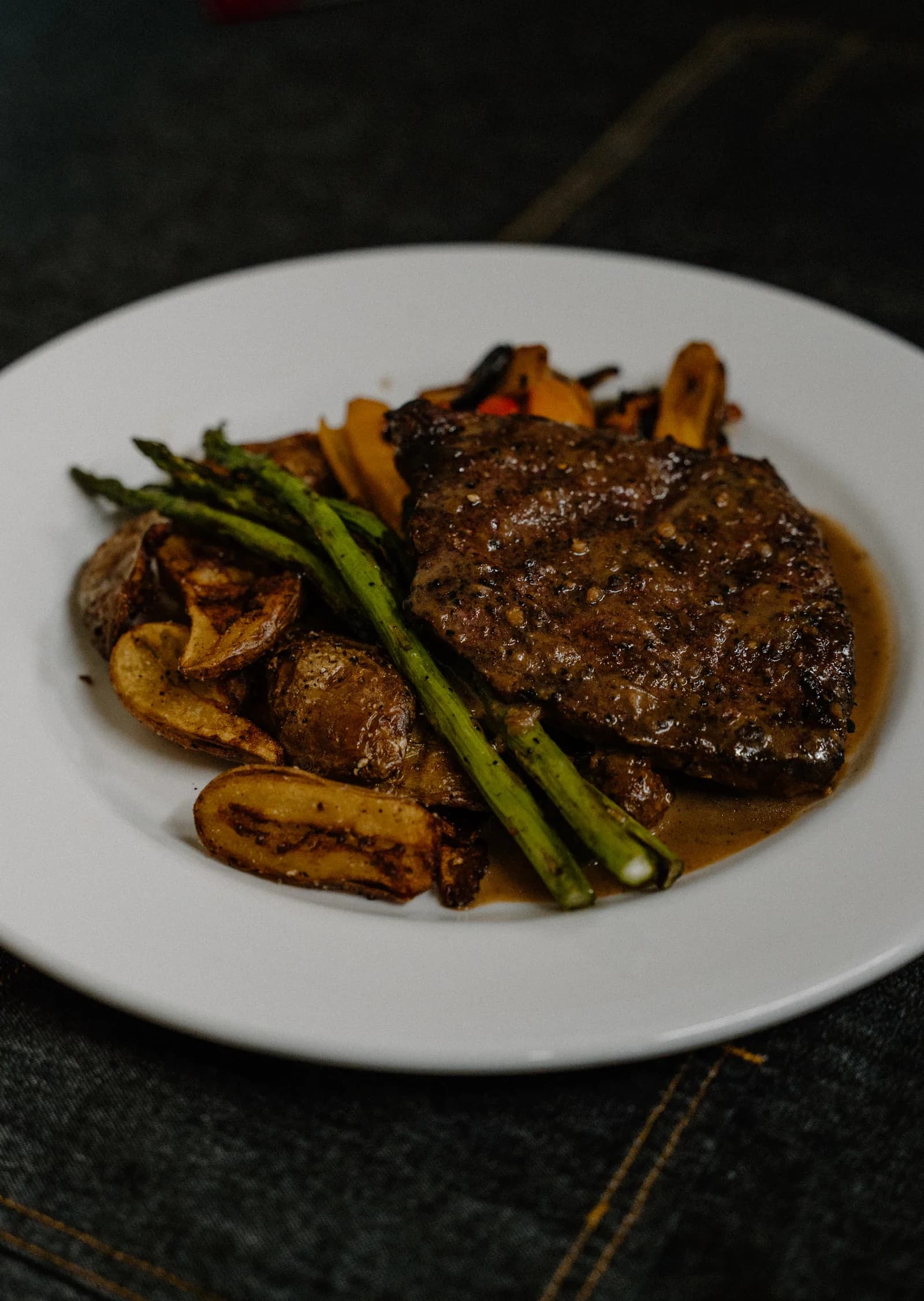 Steak and vegetables — menu direction photography